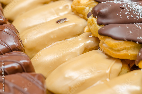 Photo: Eclair Cookies With Whip Cream Filling And Chocolate Eclair Cookies With Whip Cream Filling And Chocolate