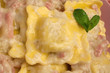 Tortelli di carne al sugo di panna e pancetta affumicata