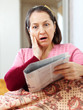   woman having grief  after readed news