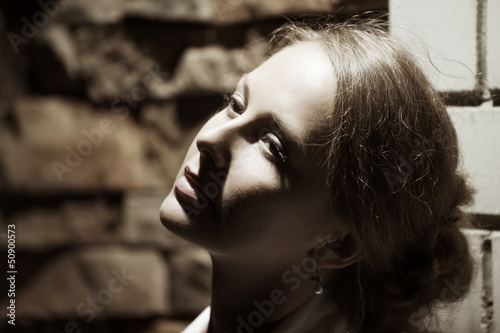 Photo: Young woman on the night city street Young woman on the night city street