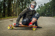 Downhill skateboarder in action
