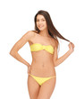 beautiful woman in bikini playing with hair