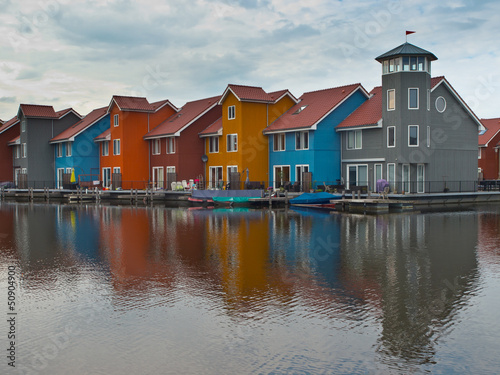 Photo: House in many color on waterfront House in many color on waterfront