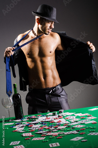 Photo: Naked broke businessman in casino Naked broke businessman in casino