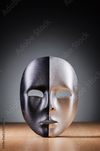 Photo: Mask against the dark background Mask against the dark background