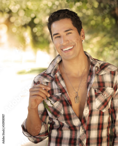 Photo: Guy smiling outside Guy smiling outside