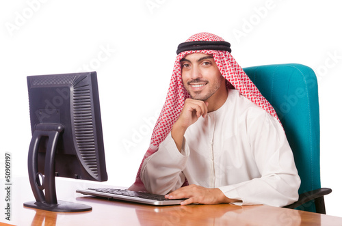 Photo: Arab businessman working on computer Arab businessman working on computer