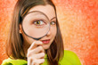 woman with magnifying glass