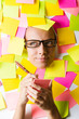 Businesswoman with lots of reminder notes