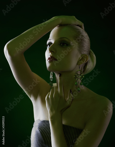Photo: beautiful blonde on green beautiful blonde on green