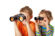 Photo: Brother and sister watching through binoculars on white Brother and sister watching through binoculars on white
