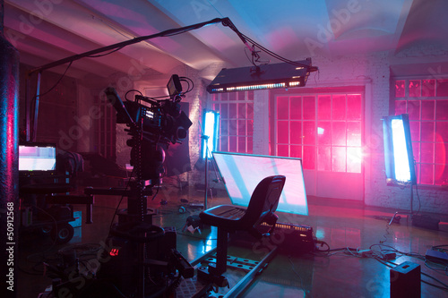 Photo: room in the purple light with equipment for a film room in the purple light with equipment for a film