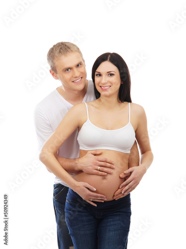 Photo: A young and lovely Caucasian couple waiting for the baby A young and lovely Caucasian couple waiting for the baby