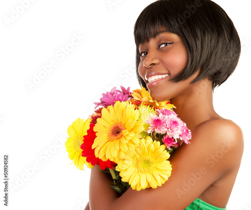 Photo: African female with fresh flowers African female with fresh flowers