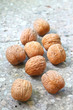 Photo: Walnuts on stony background Walnuts on stony background
