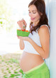 Pregnant female eat fruits
