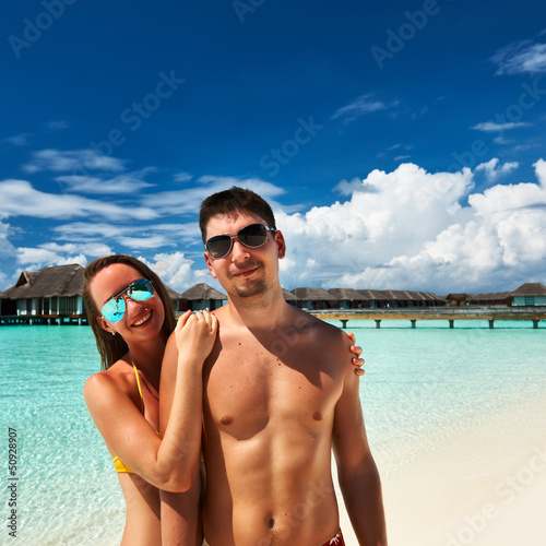 Photo: Couple on a beach at Maldives Couple on a beach at Maldives