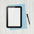 Blank digital tablet on a white desk