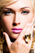 beautiful face of young woman with fashion makeup