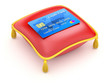 Illustration: Red pillow with credit card Red pillow with credit card