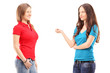 Two young females having a conversation