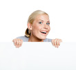 Girl keeping huge sheet of white paper