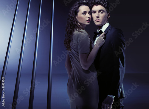 Photo: Sensual woman holding her boyfriend very close Sensual woman holding her boyfriend very close
