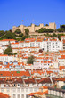 Sao Jorge castle over the old rooftops of Lisboa, Portugal