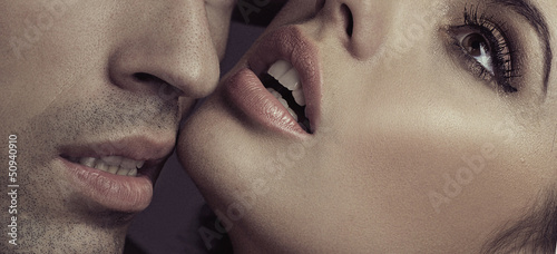 Photo: Young couple and sensual lips of lady Young couple and sensual lips of lady
