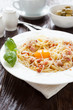 tasty pasta carbonara with egg yolk in the middle