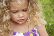 Photo: little girl looking down little girl looking down