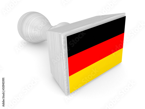 Photo: Wooden stamp with german flag. Wooden stamp with german flag.