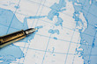 Atlas and pen