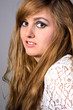 Young blond woman with beautiful brown eyes