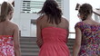 Happy female friends in the city, super slow motion