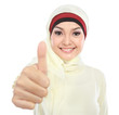 young muslim woman showing thumb up