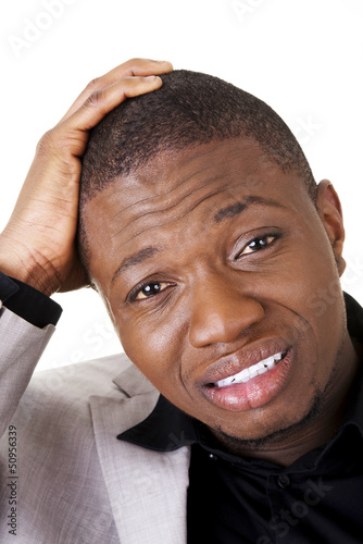 Photo: Young black troubled businessman Young black troubled businessman