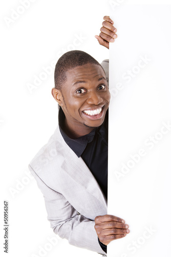 Photo: Businessman showing blank advertisement Businessman showing blank advertisement