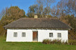 Photo: Ancient traditional ukrainian rural cottage with a straw roof Ancient traditional ukrainian rural cottage with a straw roof