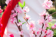 plastic wreath of Apple blossom flowers with sunlight.