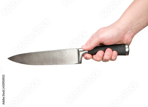 Photo: hand with a kitchen knife hand with a kitchen knife