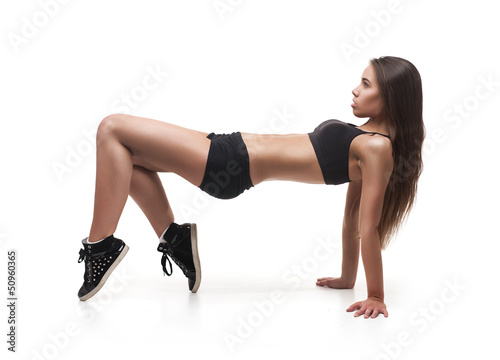 Photo: sport girl doing exercise sport girl doing exercise