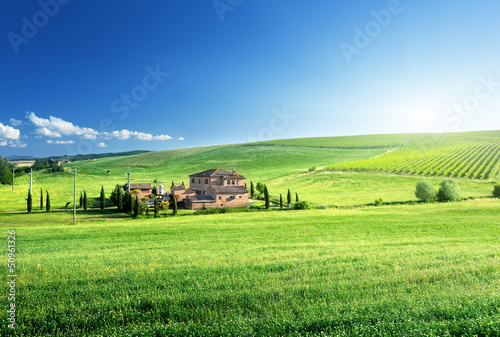 Photo: Tuscany landscape with typical farm house, Italty Tuscany landscape with typical farm house, Italty