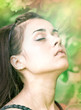 Photo: sensual portrait of young lady enjoying in summer park sensual portrait of young lady enjoying in summer park