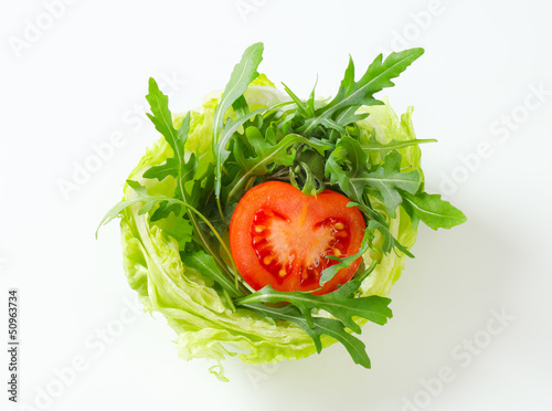 Photo: Rocket salad in lettuce bowl Rocket salad in lettuce bowl