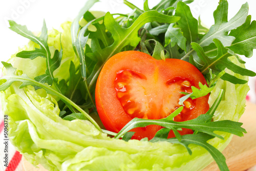 Photo: Rocket salad in lettuce bowl Rocket salad in lettuce bowl