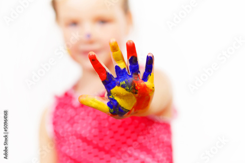 Photo: happy child with paint on the hands happy child with paint on the hands