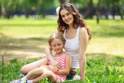 Photo: Mother and daughter in the park Mother and daughter in the park
