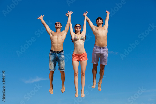 Photo: Group Of Friends Having Fun On Summer Beach Group Of Friends Having Fun On Summer Beach
