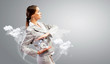 Businesswoman holding alarmclock